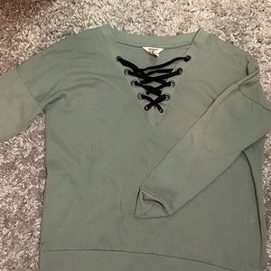 Crisscrossed trendy army green top!